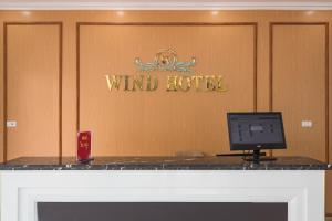 TV a/nebo společenská místnost v ubytování Wind Hotel