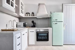 Kuchnia lub aneks kuchenny w obiekcie Terra Mare Suites