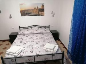 Postel nebo postele na pokoji v ubytování Casa NILLA