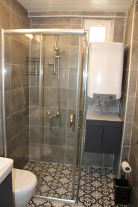 Koupelna v ubytování Alpat Homes + 18 fotografií