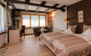 Voodi või voodid majutusasutuse Relais Bayard toas