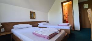 Postel nebo postele na pokoji v ubytování Guest House Tiha noć