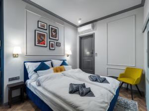 Posteľ alebo postele v izbe v ubytovaní A22 Boutique Suites
