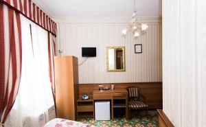 TV a/nebo společenská místnost v ubytování Hotel Artromano