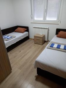 Una cama o camas en una habitación de Kod Šefa