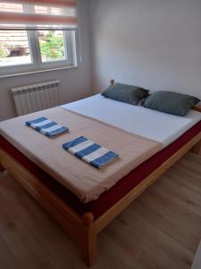 Una cama o camas en una habitación de Kod Šefa