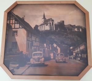 a picture of a town with cars on a street at Gästehaus Im Tal 18 in Hellenthal