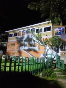 a building with stairs on the side of it at Neelum Good View in Shardi