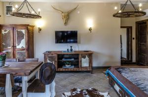 TV a/nebo společenská místnost v ubytování Rezeda Resort