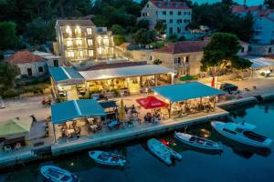 an aerial view of a marina with boats in the water at Corallium Precious in Pomena