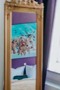 Postel nebo postele na pokoji v ubytování Boutique Hotel Rothenburger Hof