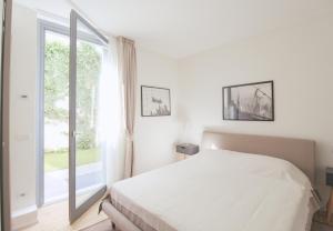 Posteľ alebo postele v izbe v ubytovaní Residenza I Melograni - Suite