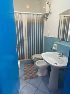 Koupelna v ubytování Residence Lampedusa Blu