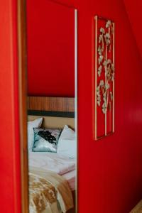 Postel nebo postele na pokoji v ubytování Boutique Hotel Rothenburger Hof
