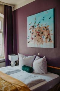 Postel nebo postele na pokoji v ubytování Boutique Hotel Rothenburger Hof