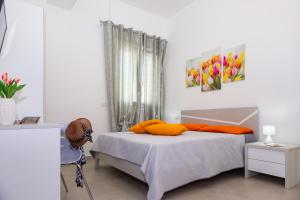 Postel nebo postele na pokoji v ubytování Paloma B&B