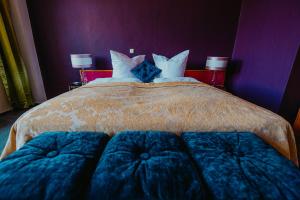 Postel nebo postele na pokoji v ubytování Boutique Hotel Rothenburger Hof