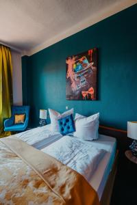 Postel nebo postele na pokoji v ubytování Boutique Hotel Rothenburger Hof