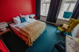 Postel nebo postele na pokoji v ubytování Boutique Hotel Rothenburger Hof