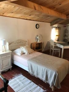 Postel nebo postele na pokoji v ubytování La Charmeuse