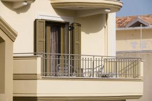 A balcony or terrace at Maria's City Villa