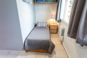 Postel nebo postele na pokoji v ubytování Grandalla Pedrous + 1 fotografie