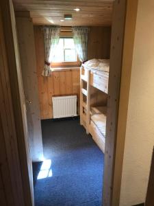 Posteľ alebo postele v izbe v ubytovaní Hüttenzeit almhütte sölden