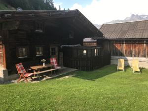 Vonkajšia záhrada v ubytovaní Hüttenzeit almhütte sölden