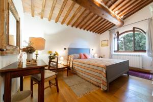 Ένα ή περισσότερα κρεβάτια σε δωμάτιο στο La Misura cottage with swimming pool +30 φωτογραφίες