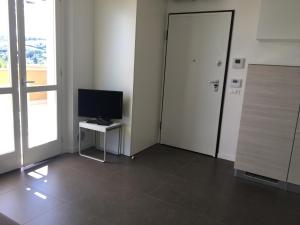 TV a/nebo společenská místnost v ubytování Skyline