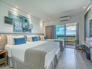 Postel nebo postele na pokoji v ubytování Japaratinga Lounge Resort - All Inclusive