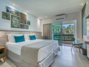 Postel nebo postele na pokoji v ubytování Japaratinga Lounge Resort - All Inclusive