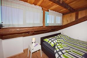 Postel nebo postele na pokoji v ubytování Alavanda Poreč - app s bazenom