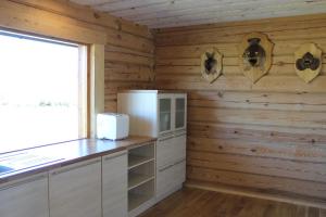 Kuchyň nebo kuchyňský kout v ubytování Rootsimaa Holiday House