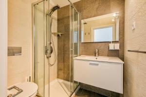 Koupelna v ubytování Sea & River Vagueira Apartment by Home Sweet Home Aveiro + 47 fotografií