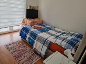 Ein Bett oder Betten in einem Zimmer der Unterkunft Del Ponte Break