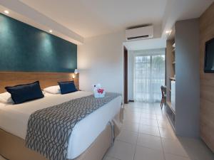 Postel nebo postele na pokoji v ubytování Salinas Maceio All Inclusive Resort