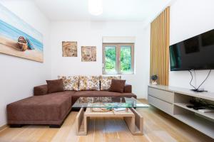 TV a/nebo společenská místnost v ubytování Apartman DULY LUX