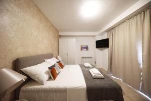 Posteľ alebo postele v izbe v ubytovaní Beachfront Apartments and Rooms