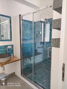 an image of a shower in a bathroom at La Casa A Mare B&B in San Saba