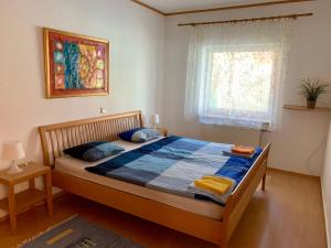 Postel nebo postele na pokoji v ubytování Haus Gerda und Anita + 49 fotografií