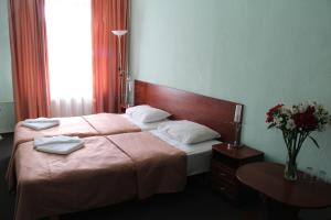 Кровать или кровати в номере Отель Особняк Молво