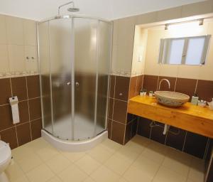 Kúpeľňa v ubytovaní Uránia Apartmanház