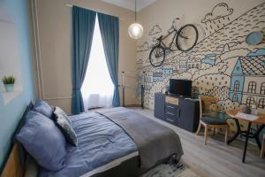 Posteľ alebo postele v izbe v ubytovaní Uránia Apartmanház