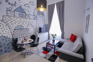 Posedenie v ubytovaní Uránia Apartmanház