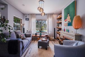 Гостиная зона в Buganvilias Do Meco Guest house