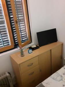 TV a/nebo společenská místnost v ubytování Apartman" Afrodita"