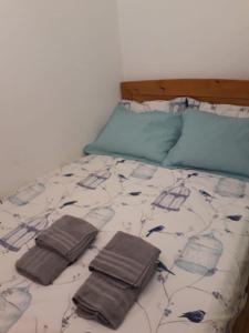 Postel nebo postele na pokoji v ubytování Apartman" Afrodita"