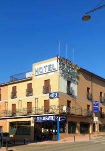 a hotel on the corner of a street at Hotel Segontia in Épila