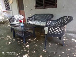 two chairs and a table on a patio at Smještaj Elena in Budva +20 photos